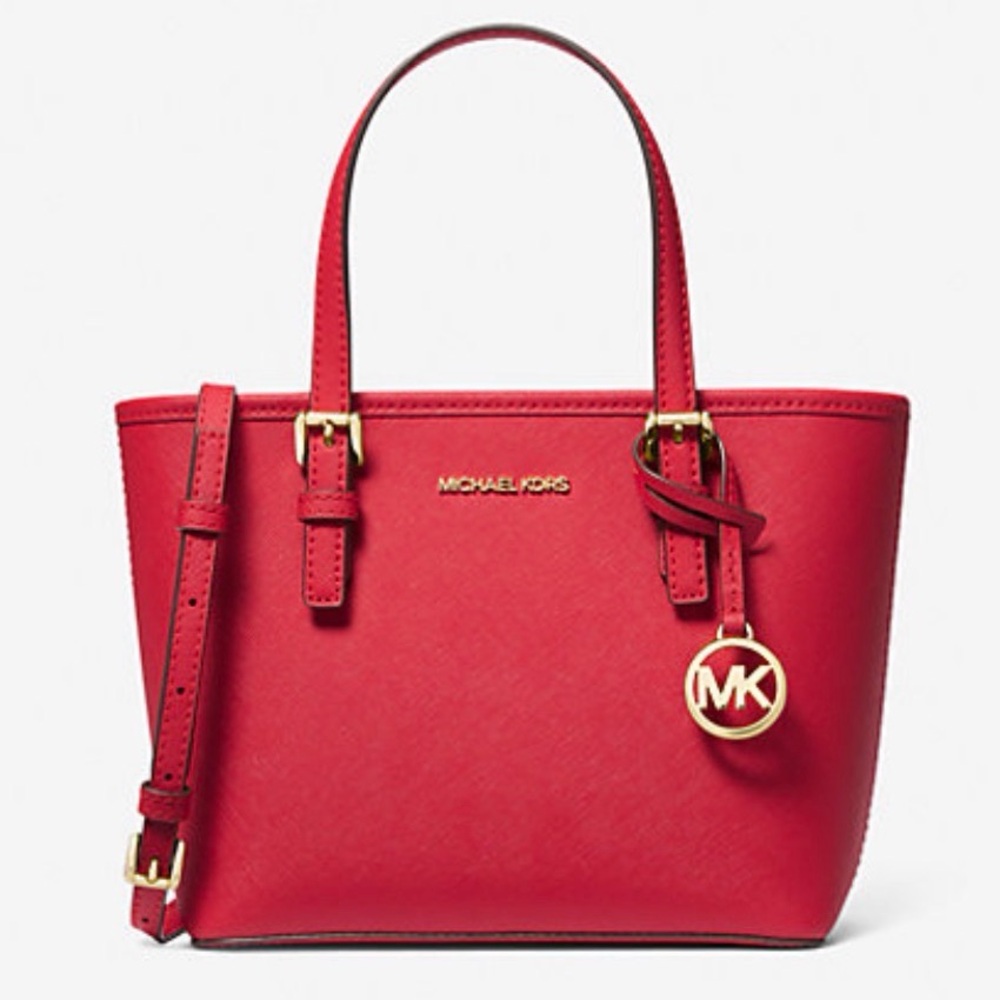 MK extra-small jet set travel tote with zippered top. Excellent condition.
